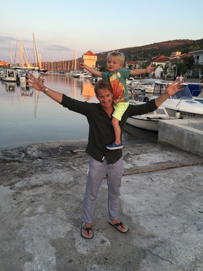 Matthew Pack CEO Holiday Extras with son Henry on his shoulders whilst on holiday in Croatia