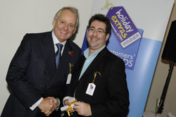 Gerry Pack presents Paul Charles of Virgin Atlantic with the award for best airline