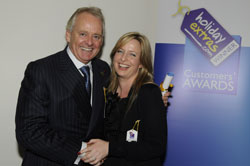 Gerry Pack presents Zita Flanagan of Aer Lingus with the award for most recommended airline for travelling with babies