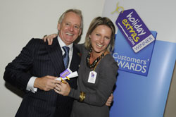 Gerry Pack presents Lynden Bulger of British Airways with the runner up award for most recommended airline for travelling with babies