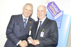 Gerry Pack presents Nick Campbell of the Crowne Plaza Heathrow with the award for best airport hotel