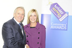 Gerry Pack presents Katherine Gordon of the Sheraton Heathrow with the runner up award for best airport hotel