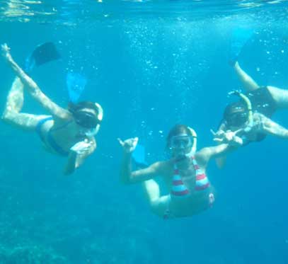 Girls snorkeling in Hawaii